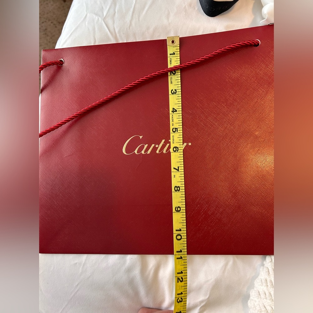 Red authentic Cartier shopping bag